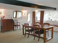 The dining room at Cherry Tree Cottage features our beautiful period elm table.  Optional 4 course dinners are served here.