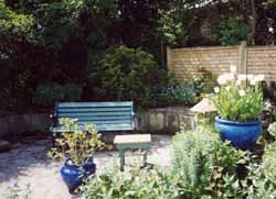 The secluded garden seating area at Cherry Tree Cottage B&B